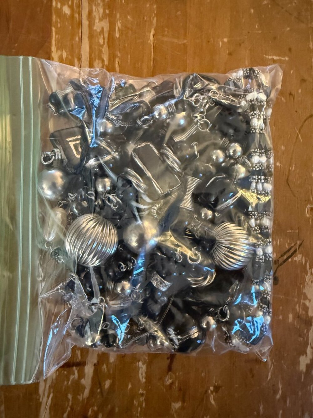 assorted bag of jewelry, black and silver, many beads